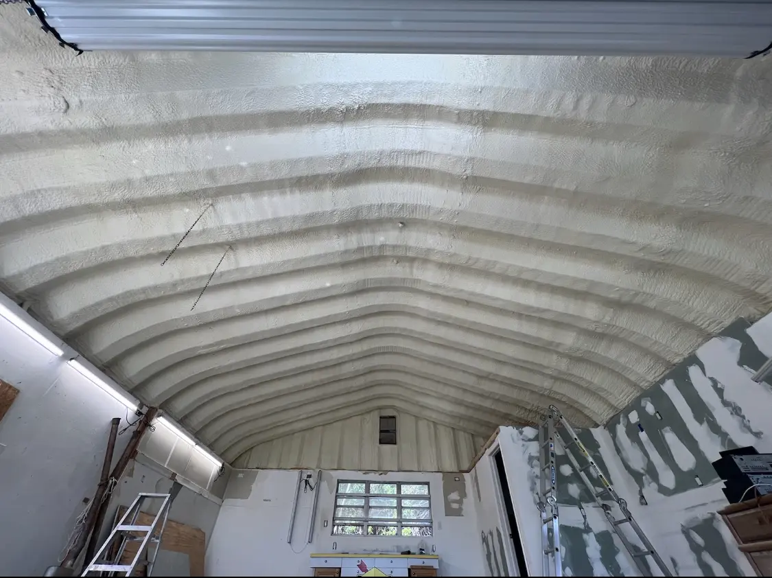 Spray polyurethane foam applied to the underside of a metal roof deck in North Greenbush